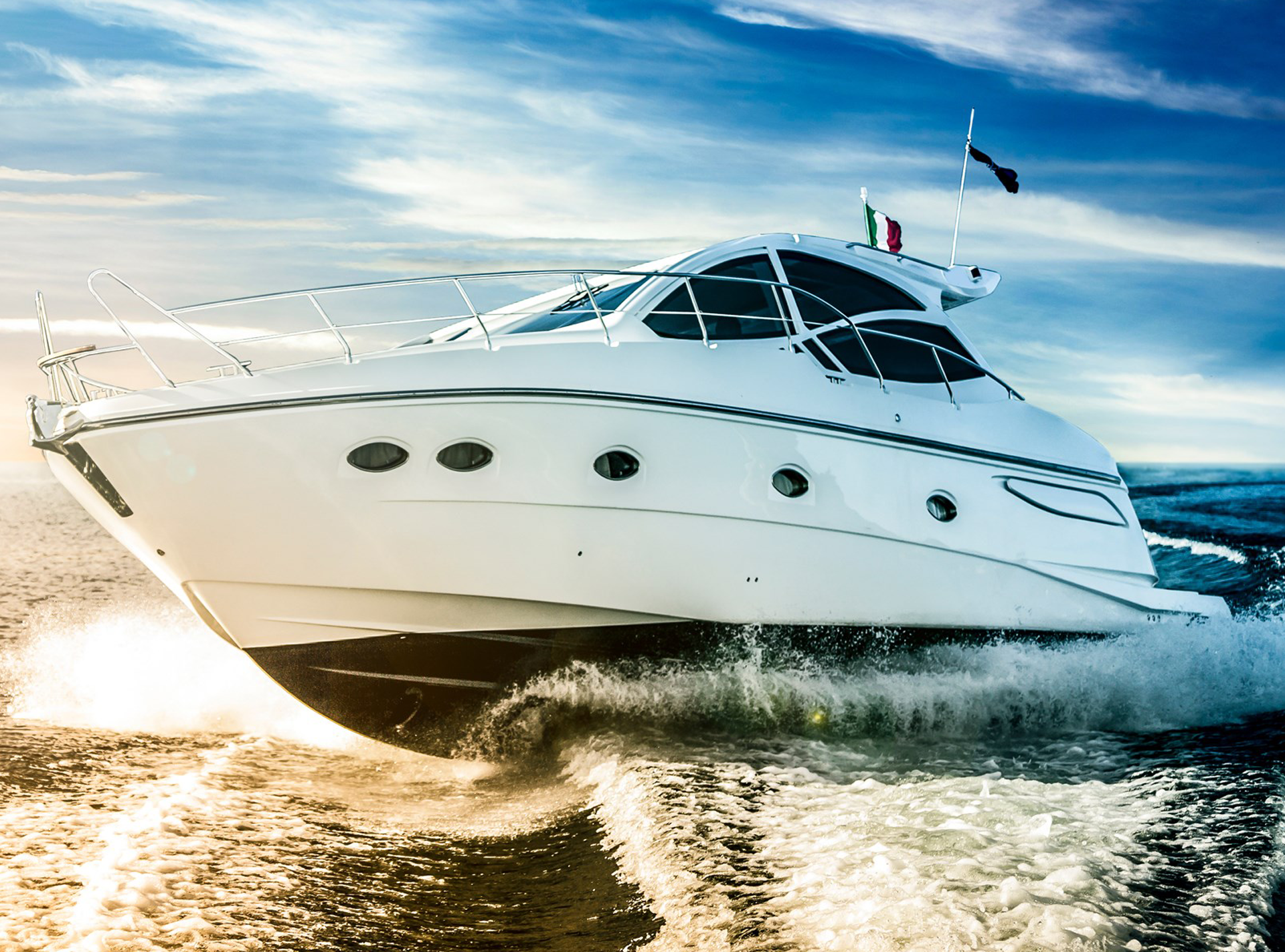 Luxurious Motor Boat Sailing The Sea At Dawn